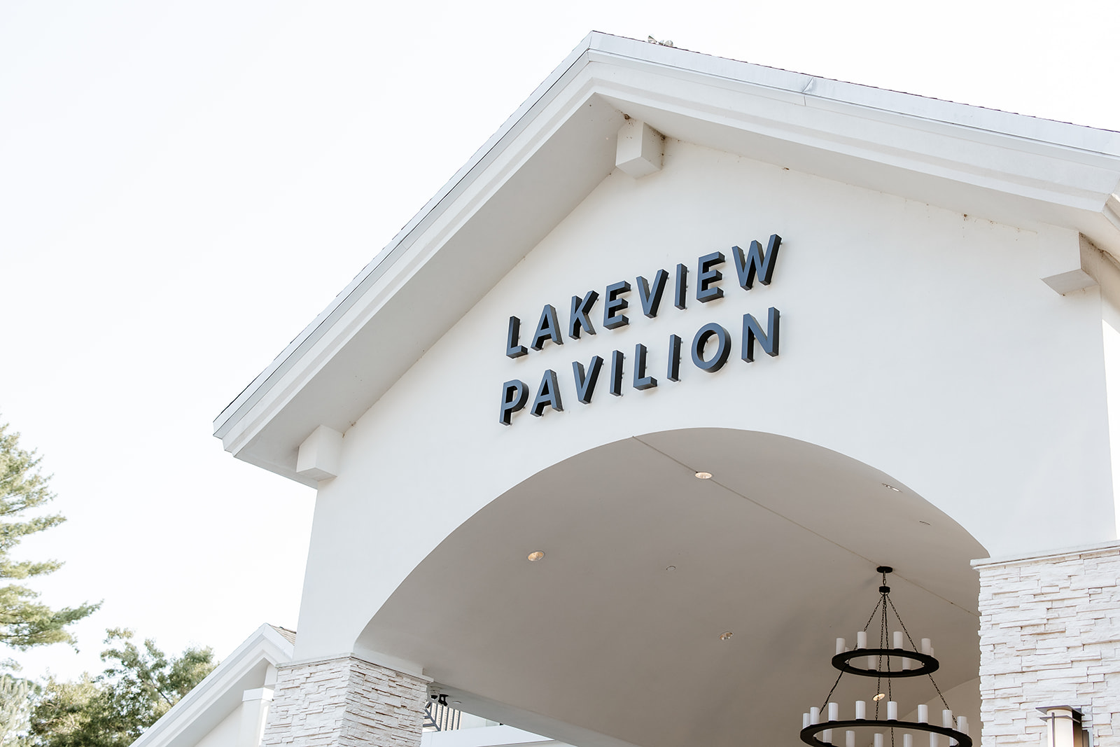 Exterior signage of "lakeview pavilion" on a building with an arched entrance.