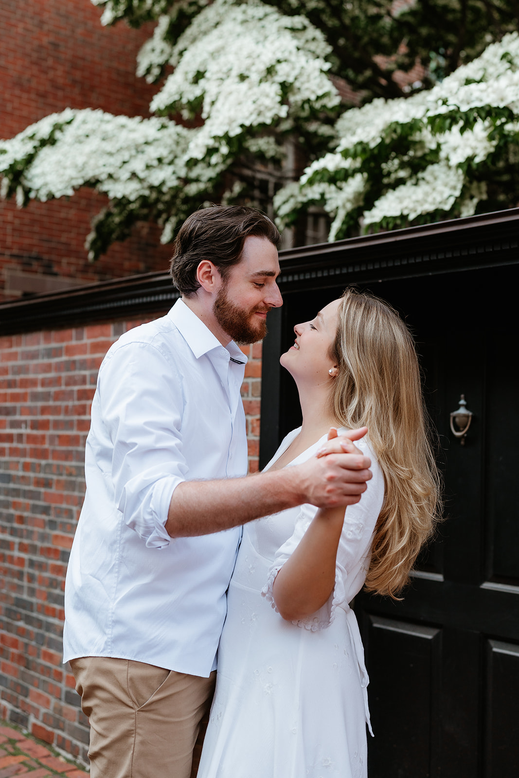 Couple dancing on the streets of Beacon Hill