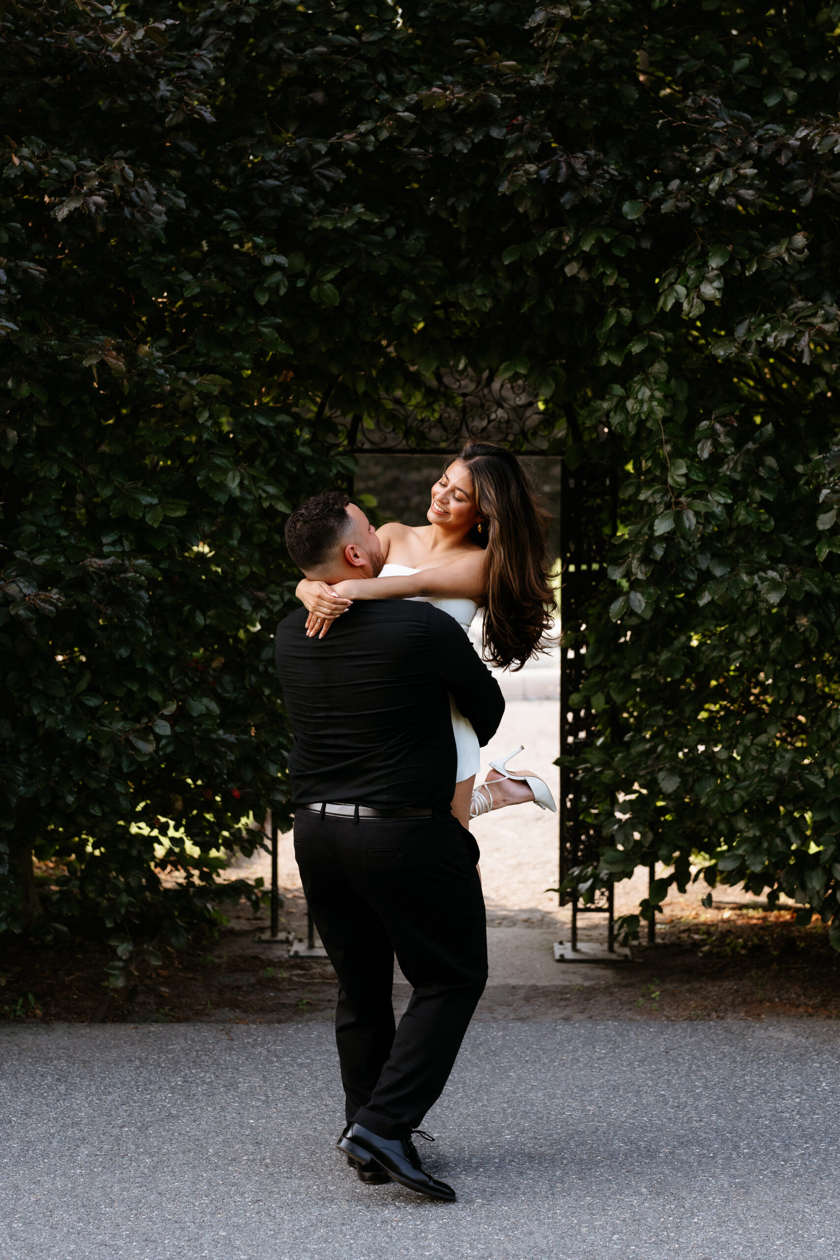 Newly engaged couple dancing for their Garden at Elm Bank Engagement Session