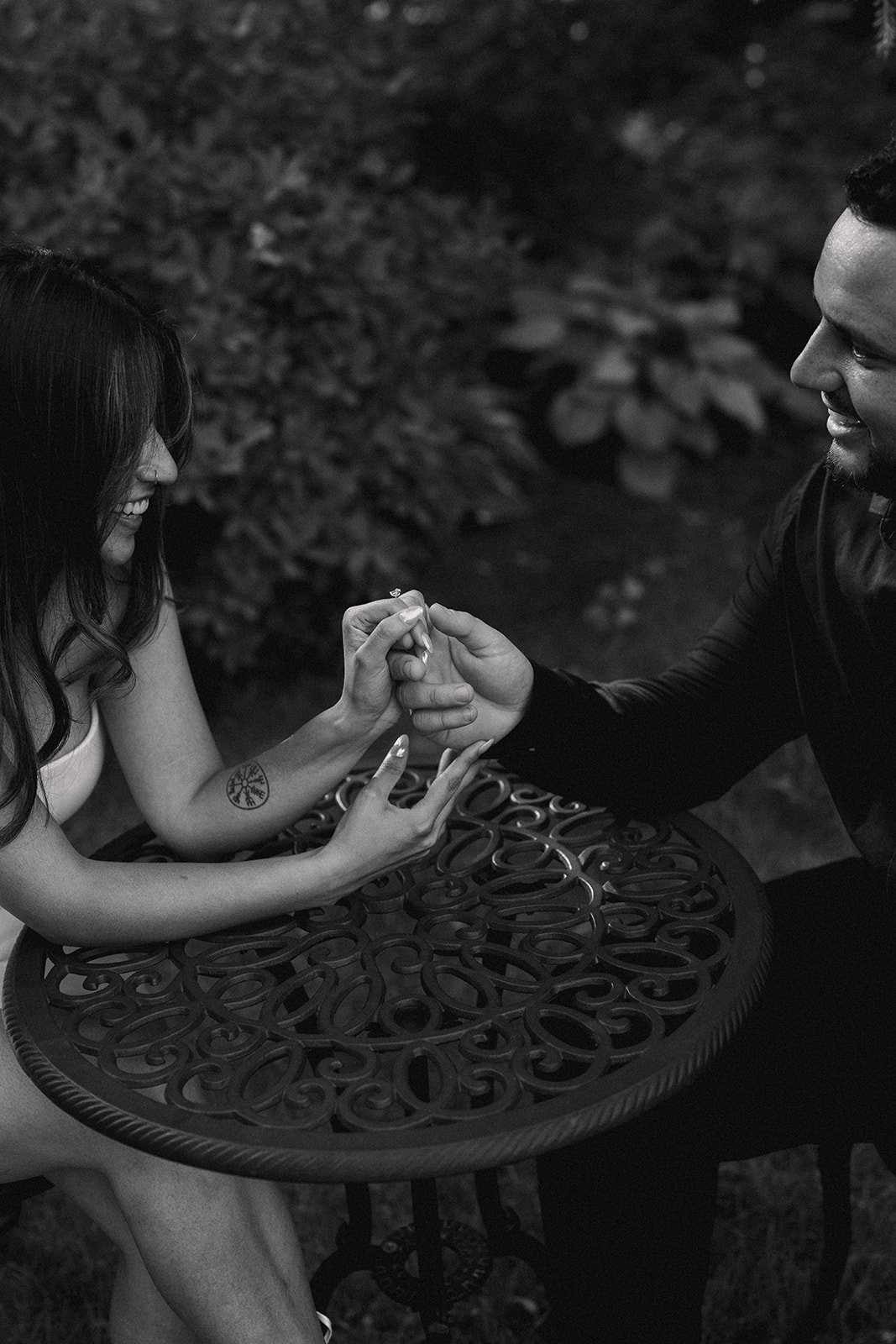 A man and woman holding hands during their engagement session