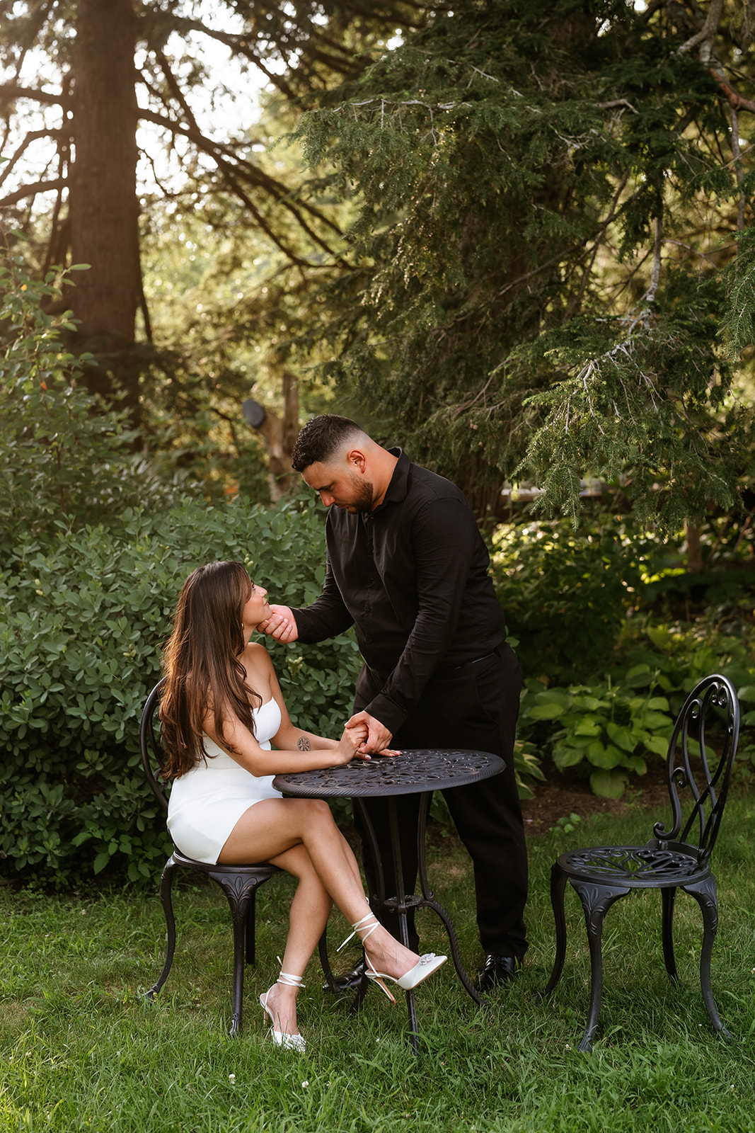 A man and woman holding hands during their engagement session