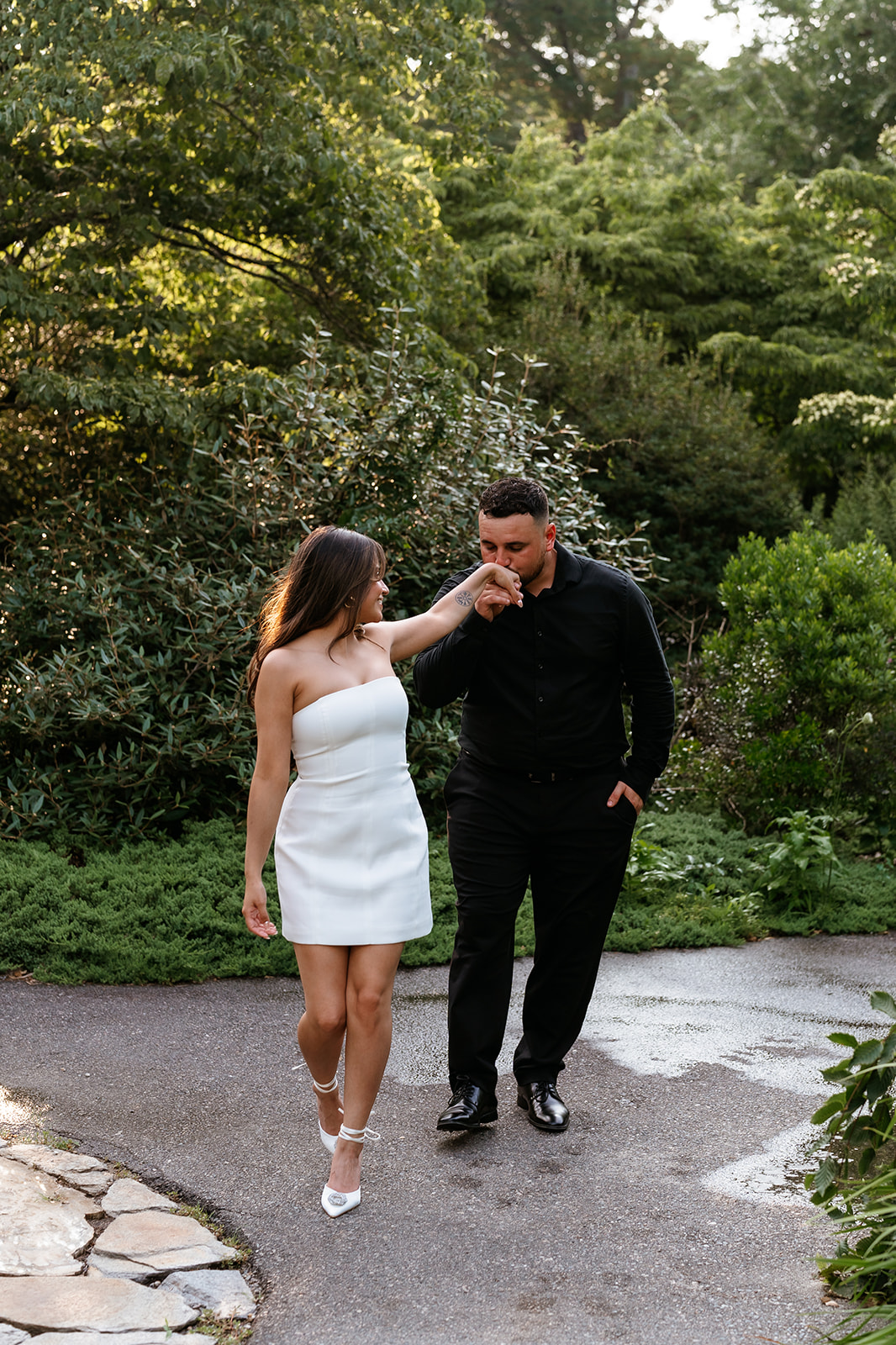 A man and woman holding hands during their engagement session