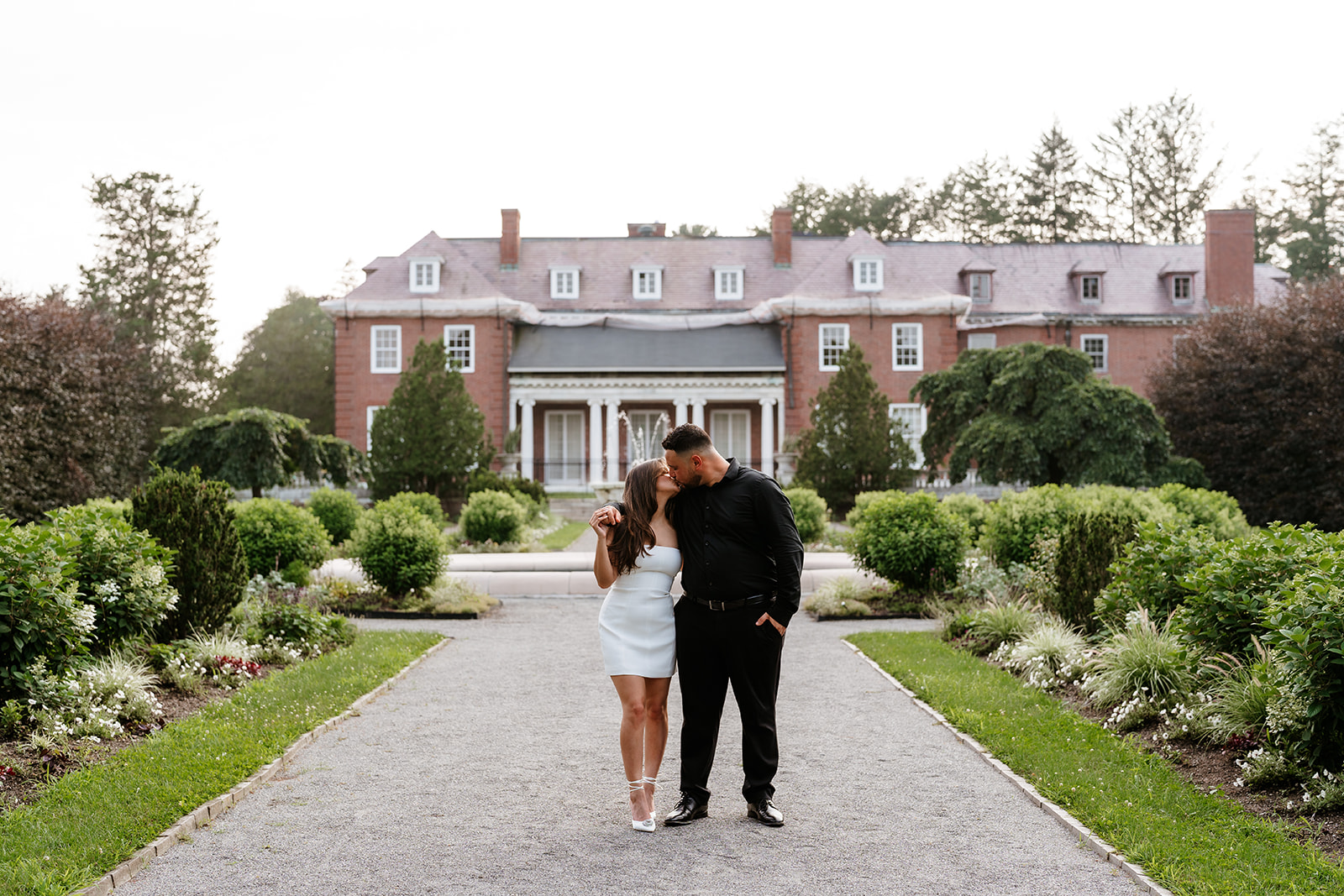 A man and woman holding hands during their engagement session