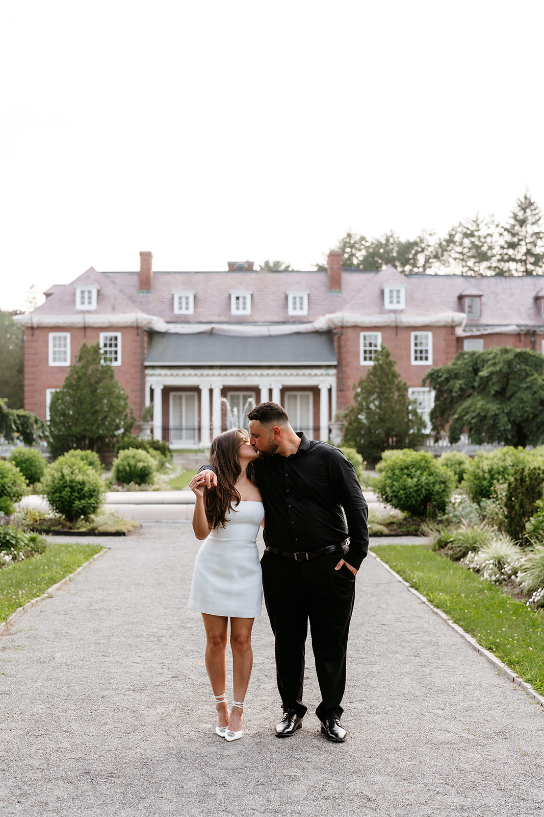 A man and woman holding hands during their engagement session