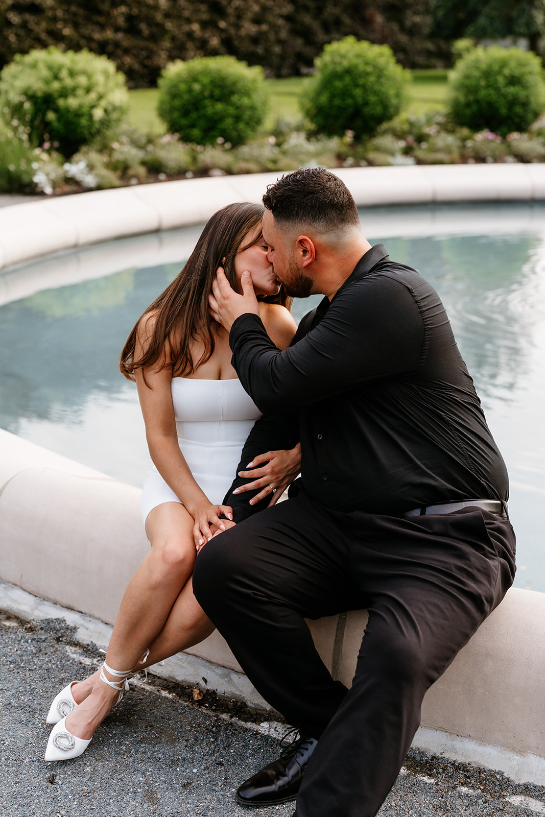 A man and woman holding hands during their engagement session