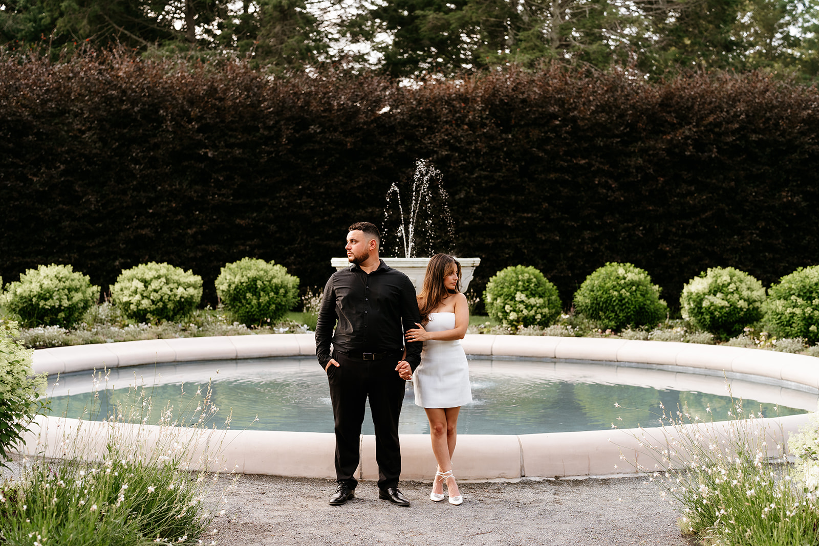 A man and woman holding hands during their engagement session