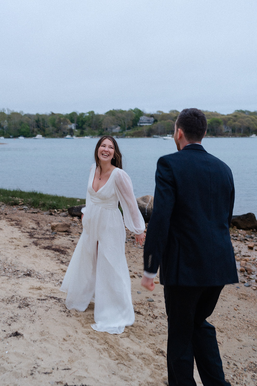 Engaged couple dancing on the beach for their Cape Cod engagement session