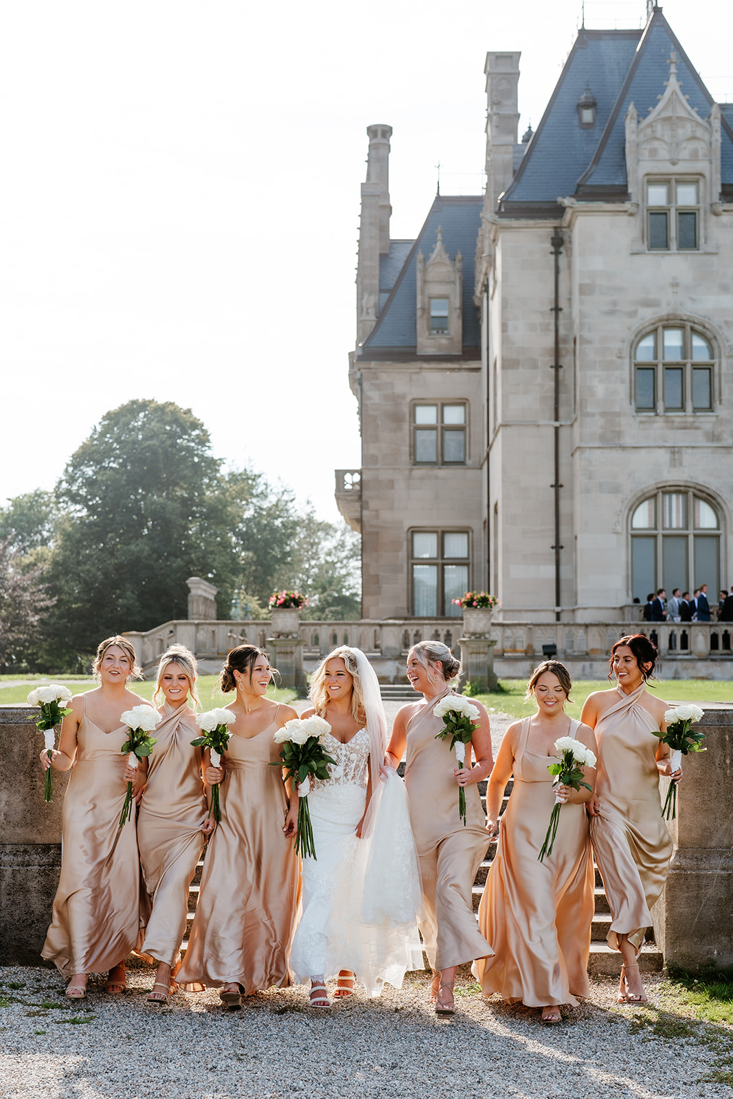 bridesmaids walking to wedding ceremony 