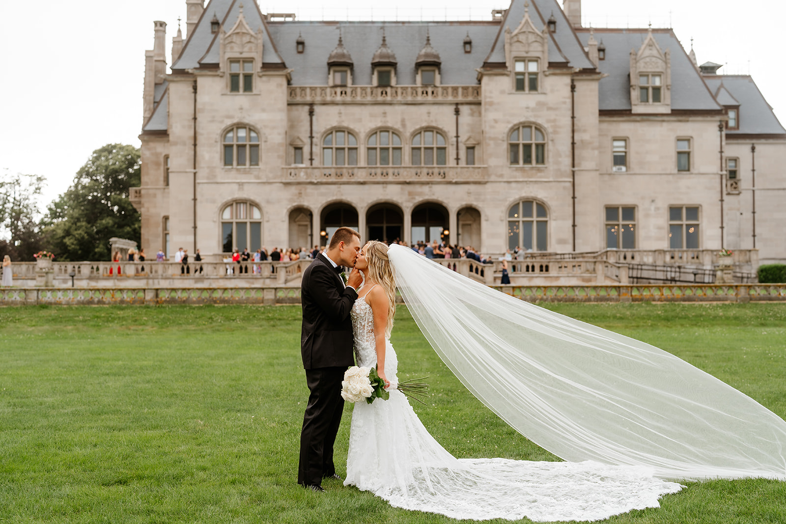 bride and groom kissing outdoor at Ochre Court 