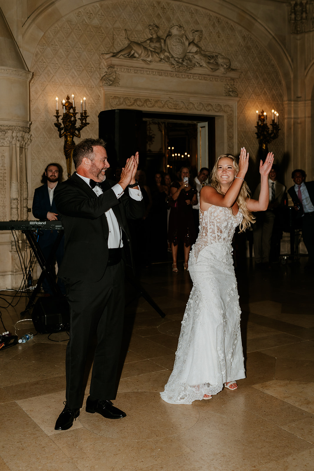 father of the bride and bride dancing during wedding reception 