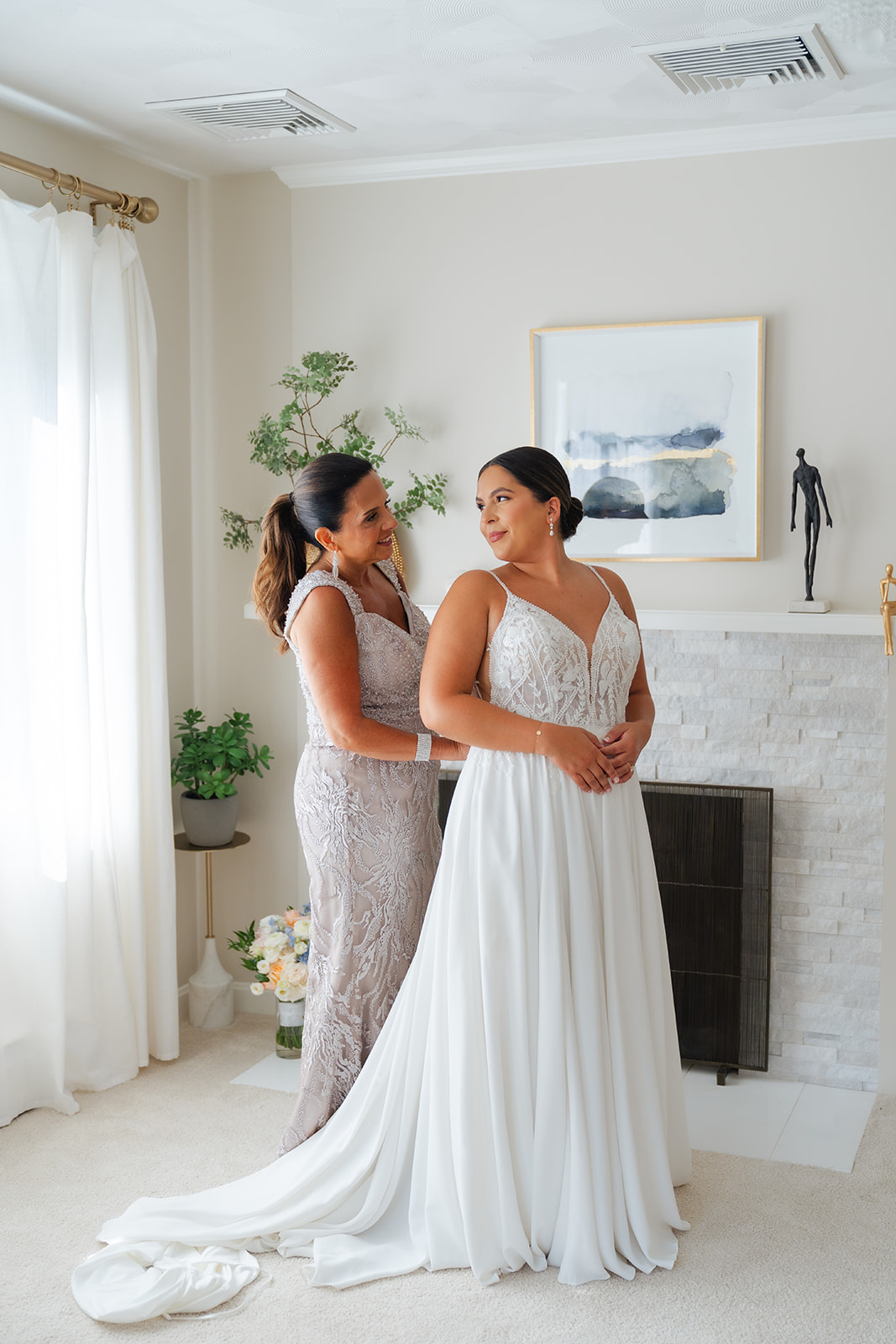 bride and mother of the bride getting ready