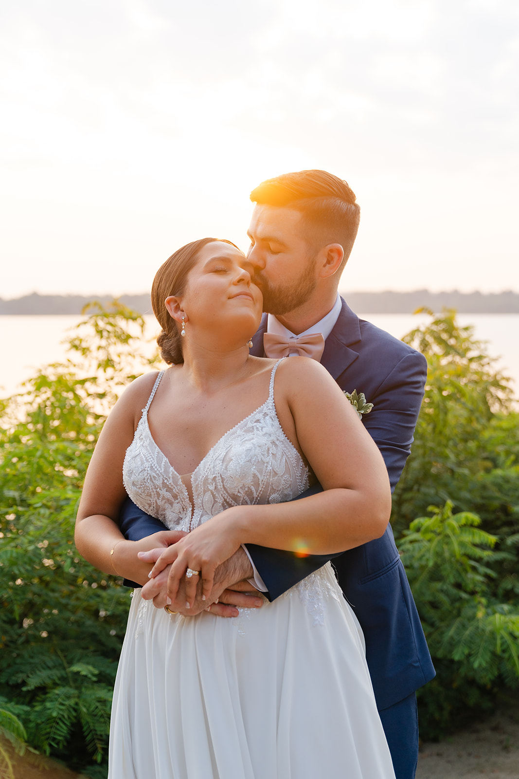 golden hour wedding portrait of bride and groom