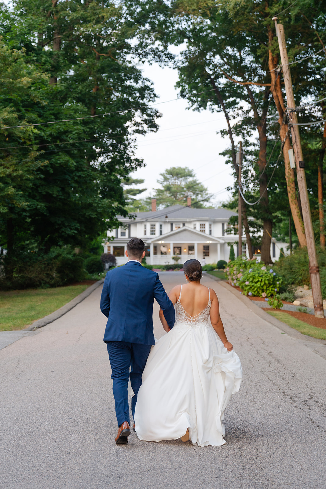 bride and groom walking to the wedding venue