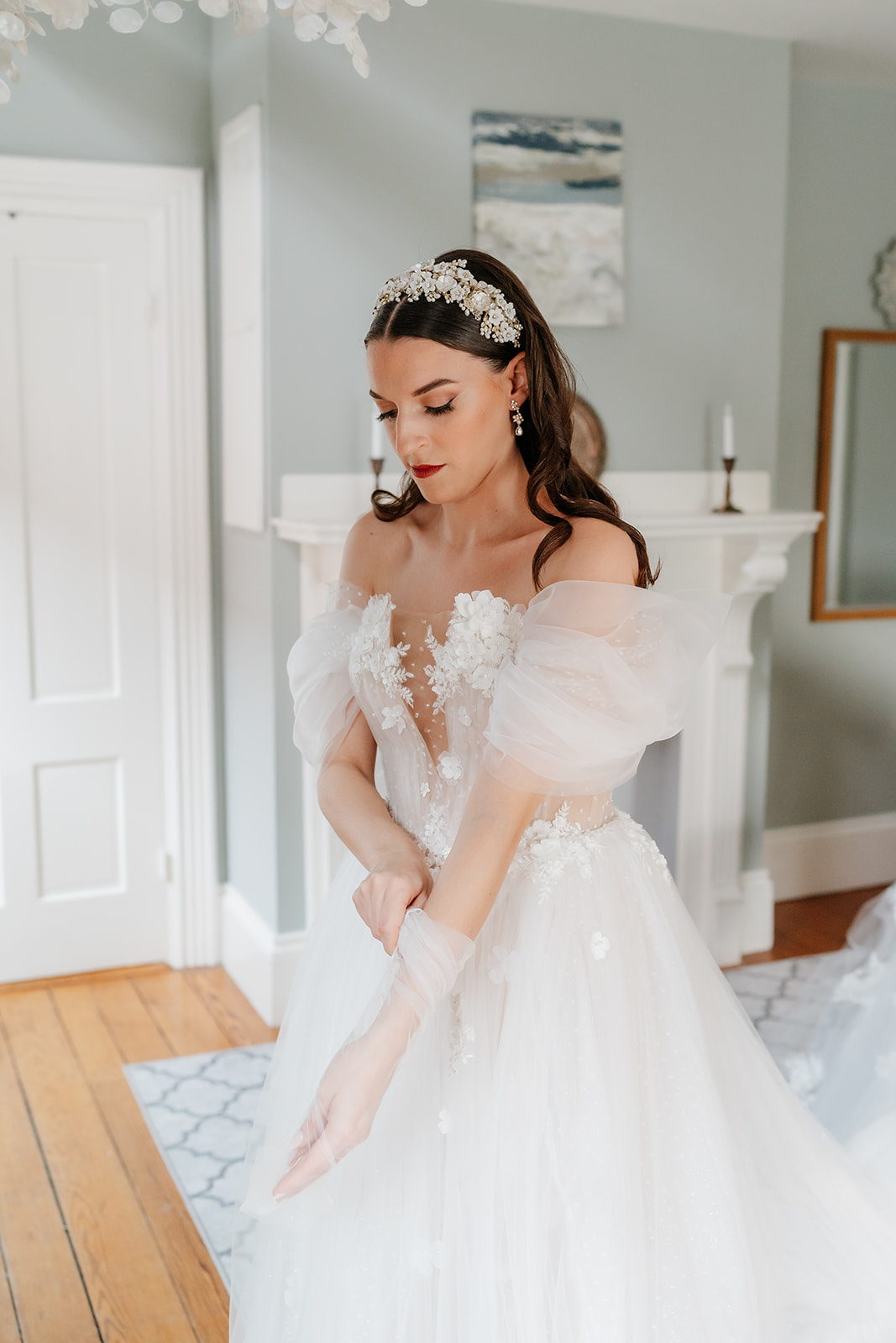 bride putting on her gloves for her fall wedding