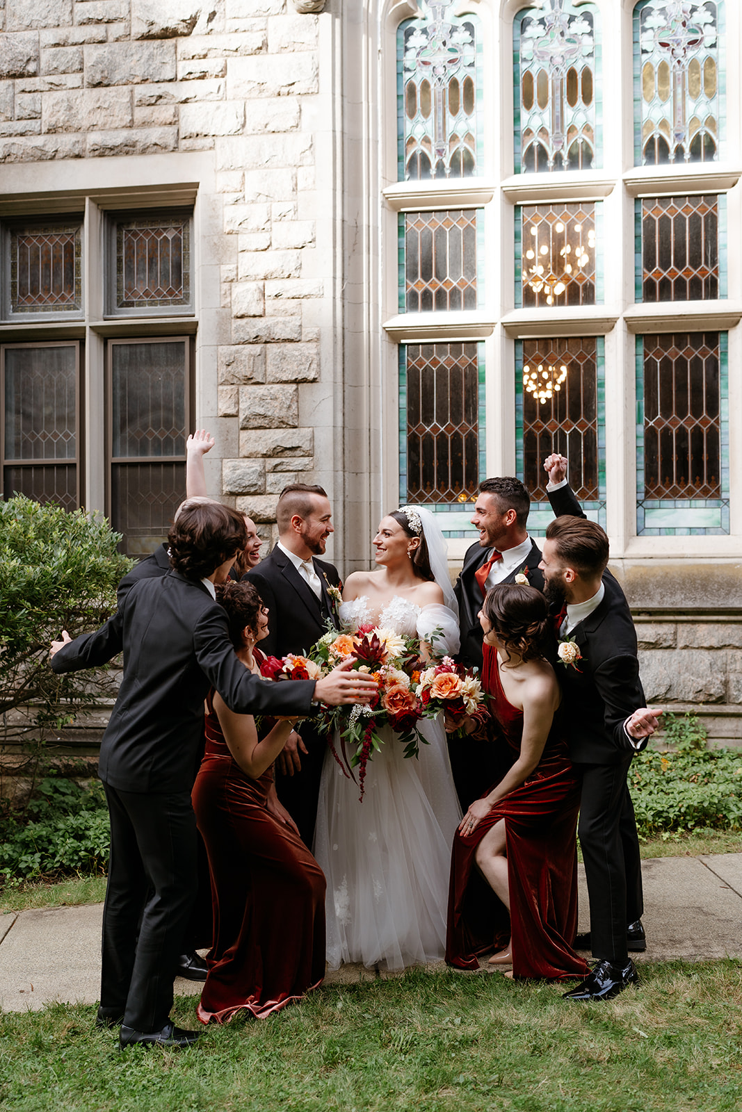 candid and fun bridal party photo outdoors