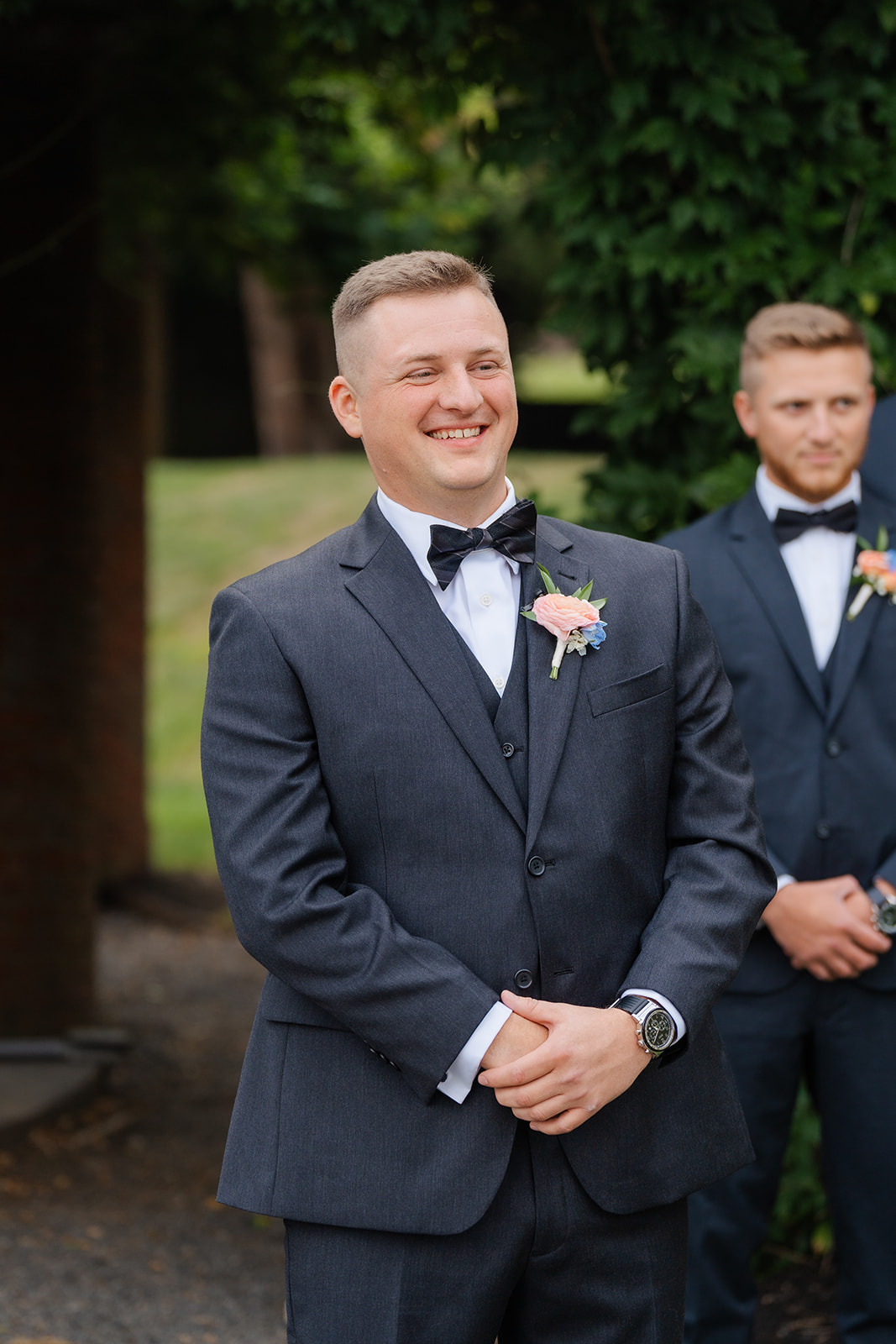 candid wedding photo of the groom during wedding ceremony