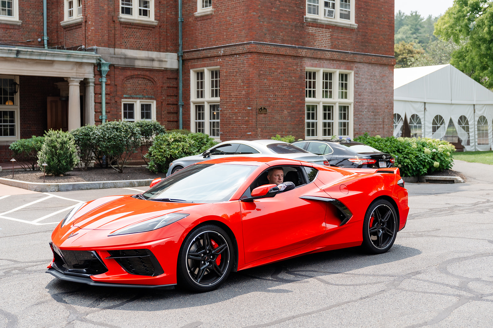 groom in a modern car to get to the wedding venue