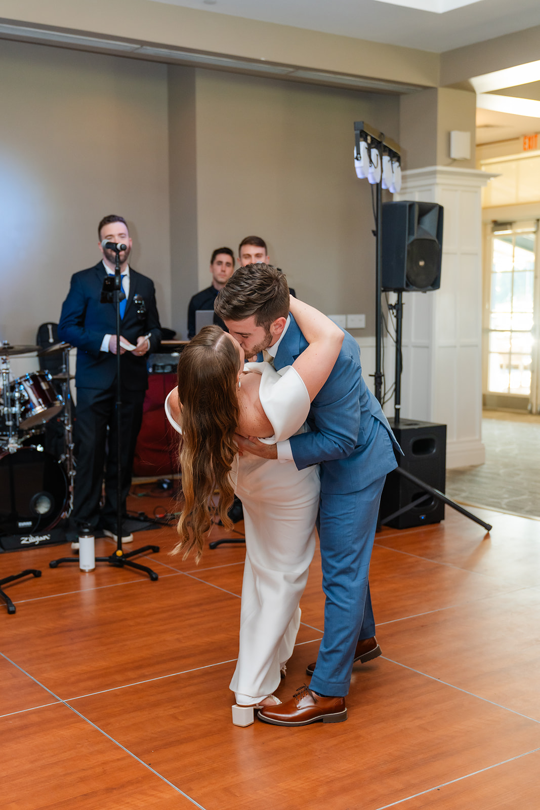 first dance of bride and groom kissing