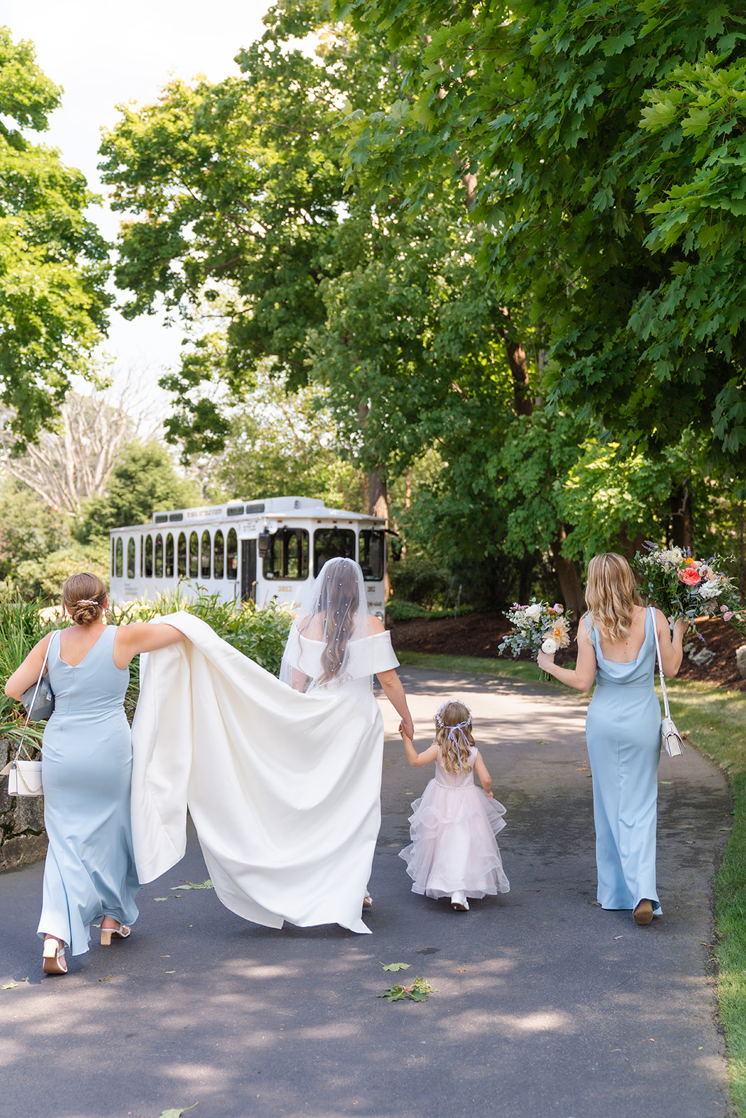 bride and bridesmaids walking to the wedding ceremony